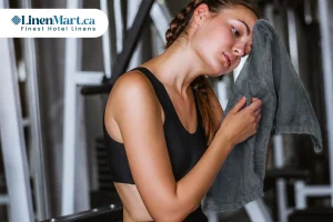 Whistler Premium Charcoal Grey 100 Cotton Gym Hand Towel in a commercial fitness center