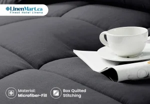 Quilted microfiber comforter styled on a warm and comfortable Canadian hotel bed for winter