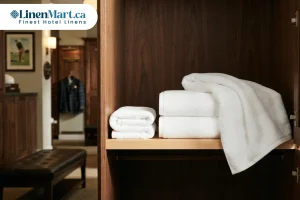 Small face towels, medium hand towels, and large bath towels organized in a golf clubhouse locker room for personal use and post-round showers